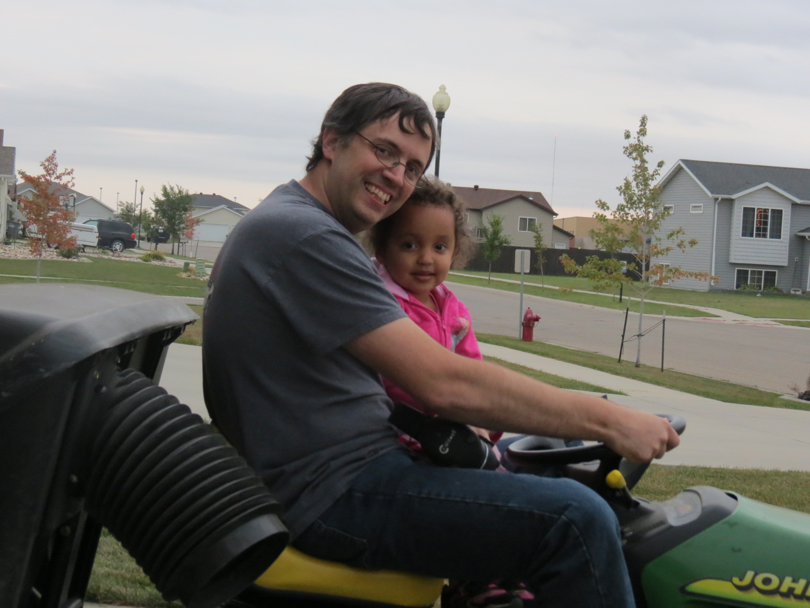 owner and daughter john deere tractor